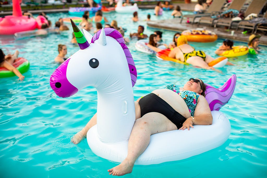Plus size woman at a pool party