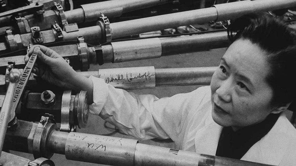 A black and white photo of Chien-Shiung Wu working on a project.