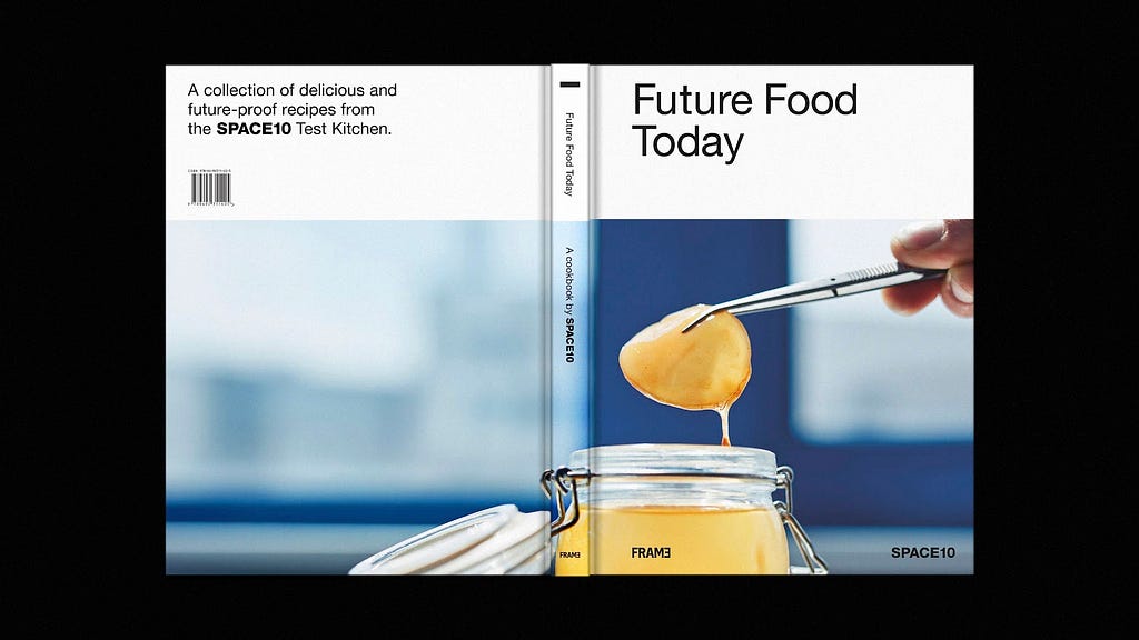 A cookbook open to see the whole cover. It reads “Future Food Today” and is published by SPACE10