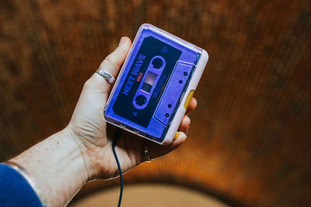 Hand holding a walkman