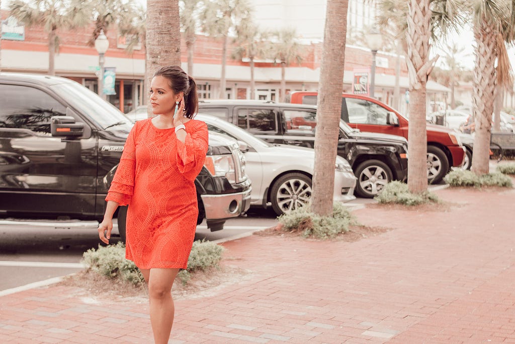 Latina woman in red dress