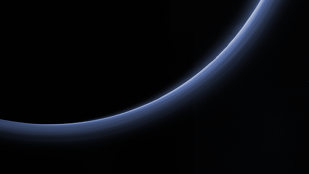 One of the last-high-resolution images of Pluto after closest approach. Only the haze layers of atmosphere are visible.