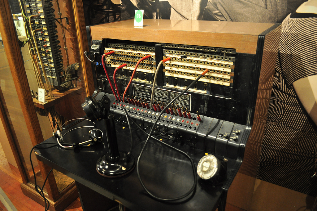 Photo of a telephone switchboard by Joe Mabel, CC BY-SA 4.0, via Wikimedia Commons