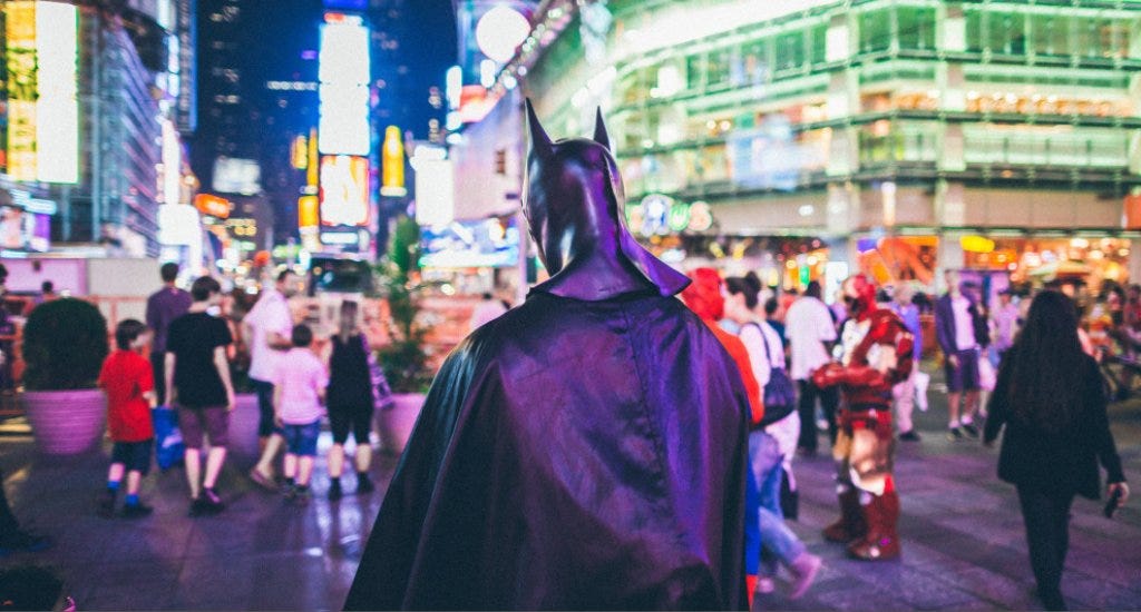 Person dressed as superhero in Times Square