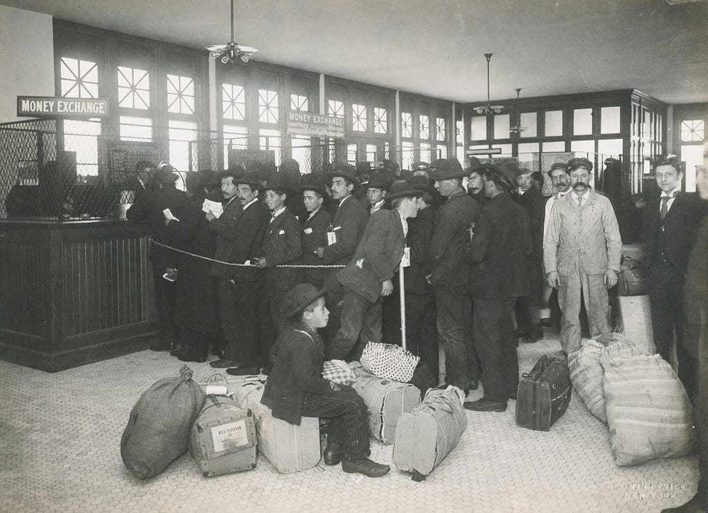 Historical image of long lines at Ellis Island