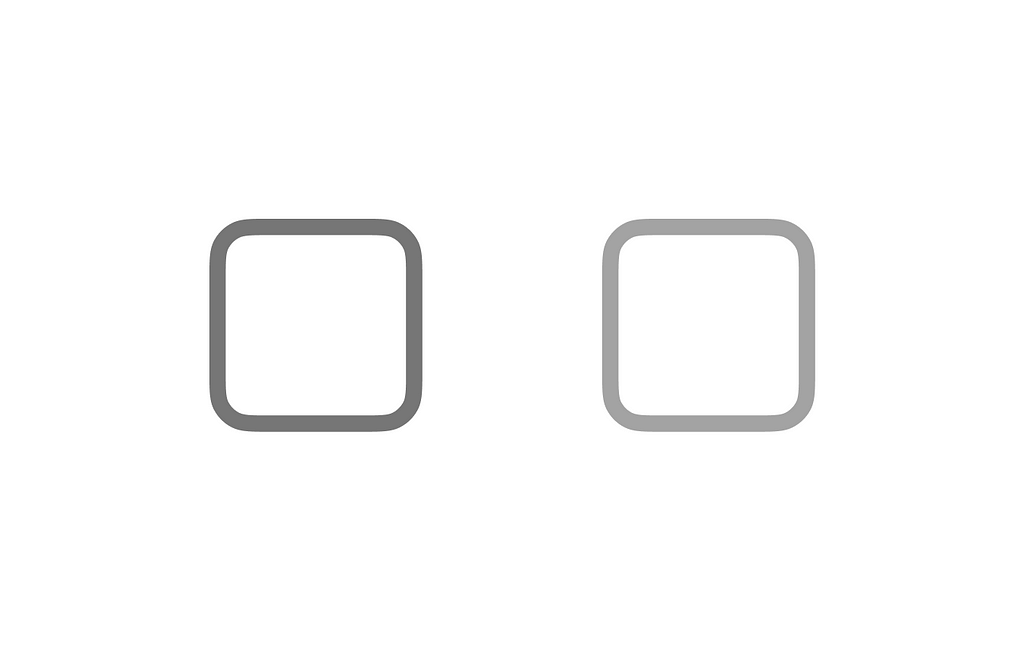Two large unselected and unlabelled checkboxes, side-by-side, each a different shade of grey.