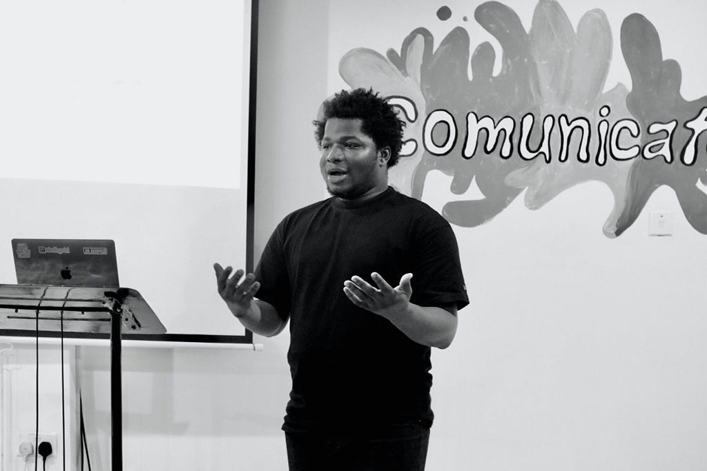Picture of myself (Francis Odeyemi) speaking at a tech bootcamp event