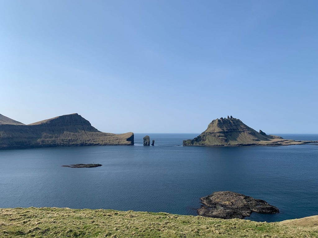 View of Drangarnir and Tindhólmur from near the famous and photogenic Skarðsáfossur waterfall.