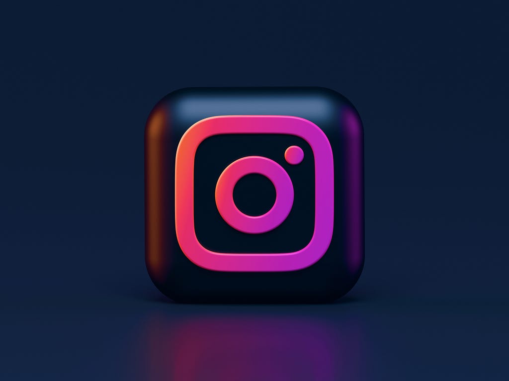 Instagram logo shining in bright neon pink