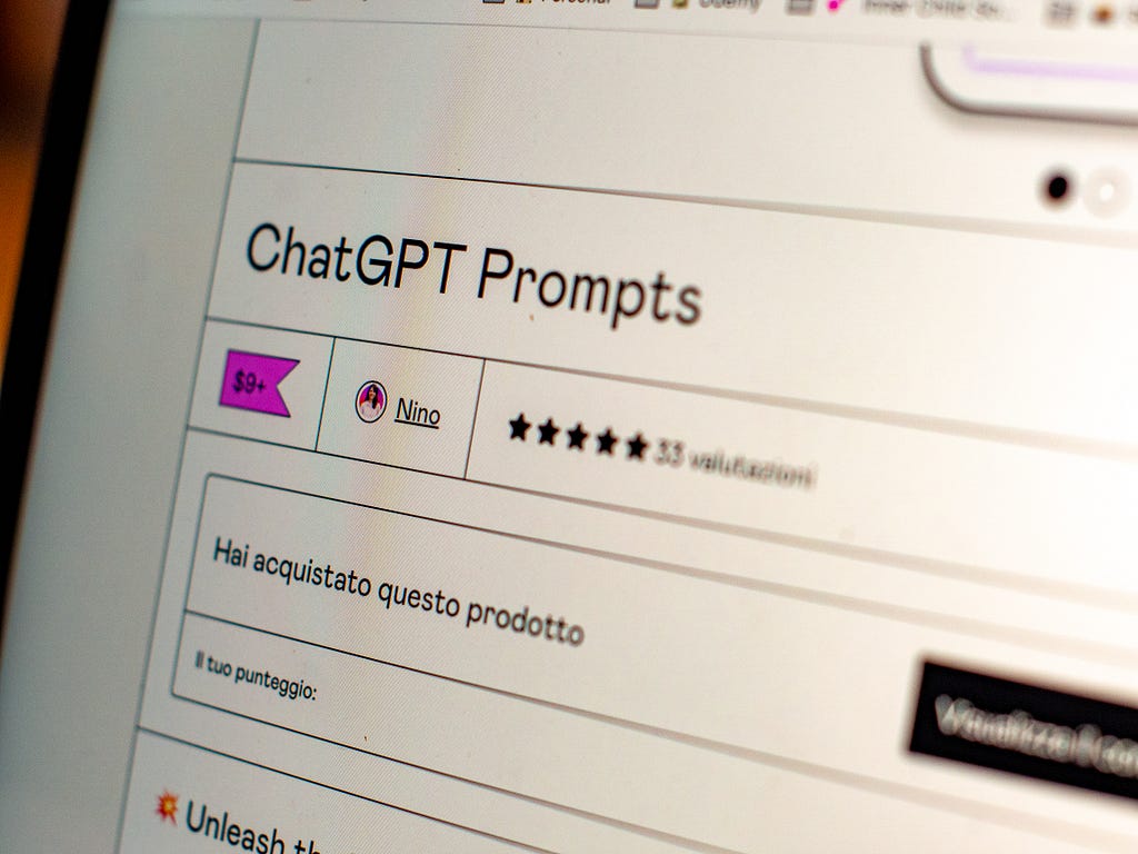 pic shows “ChatGPT Prompts” text on the computer monitor