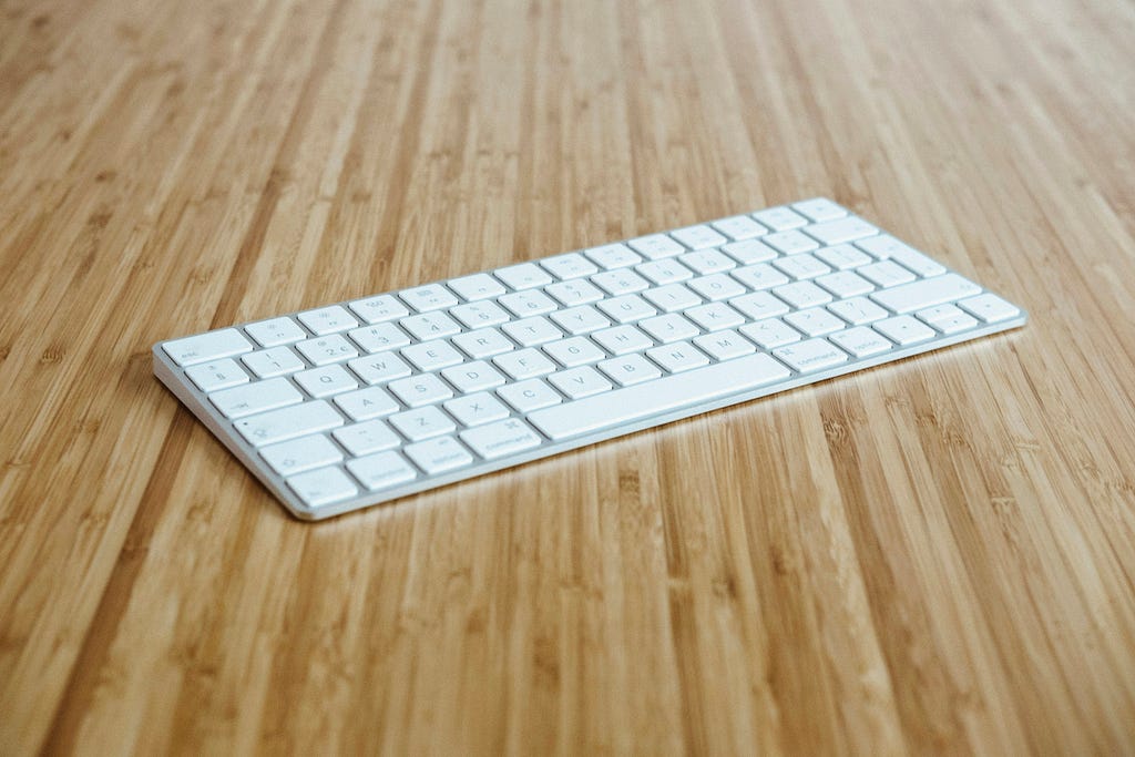 Image of an Apple Magic Keyboard on a table.