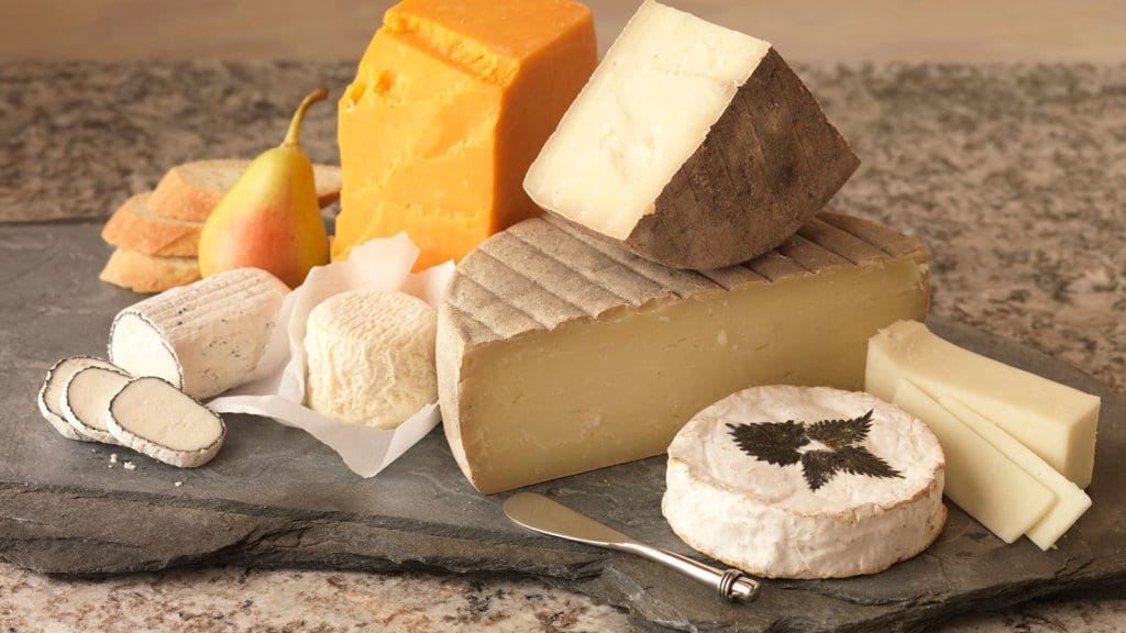 different types of cheese like harvarti, gouda, cheedar, jack