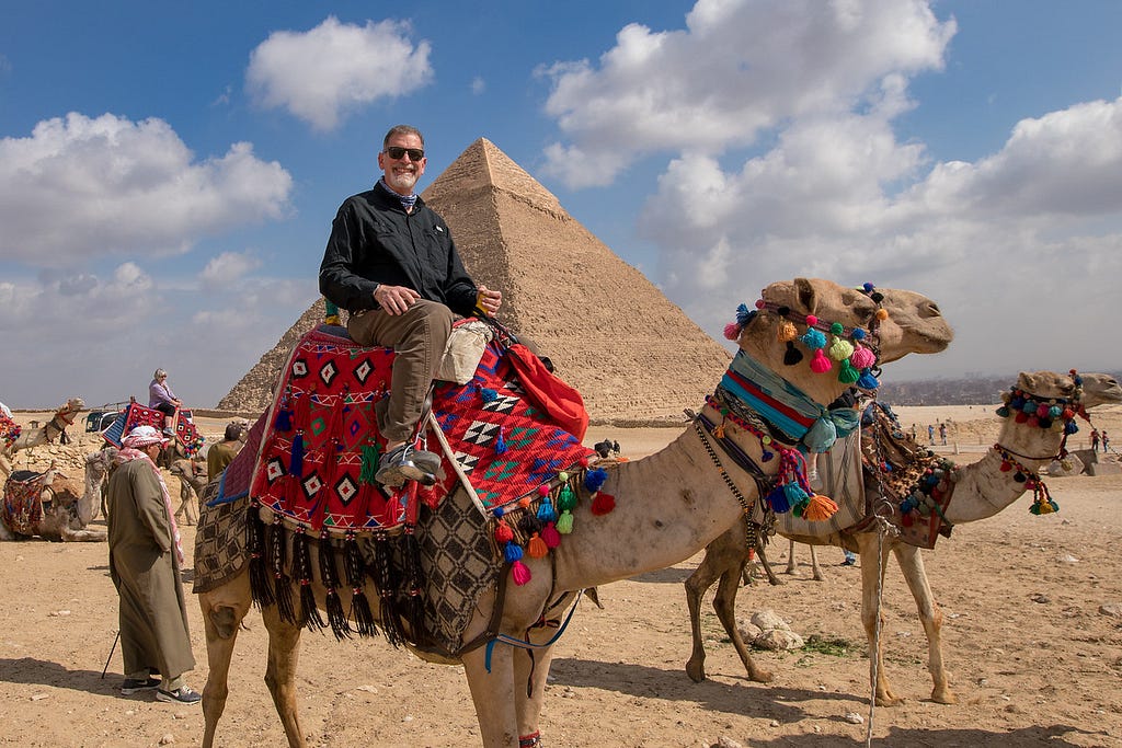 Me Riding a Camel at The Great Pyramids of Giza in Egypt