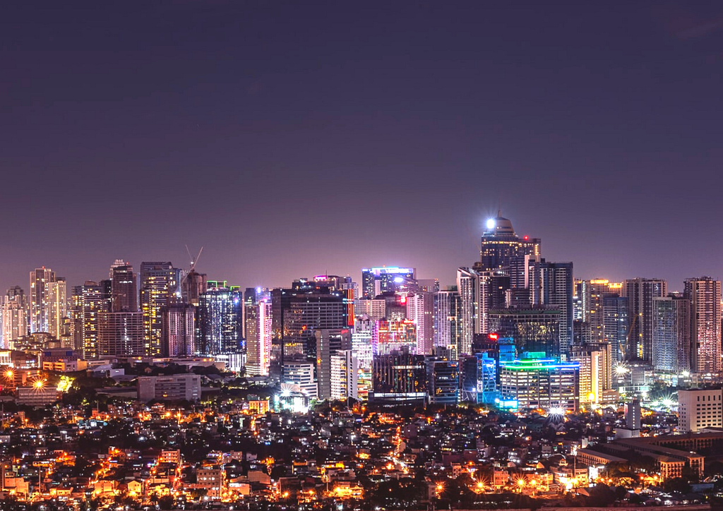 a view of a city in the Philippines at night