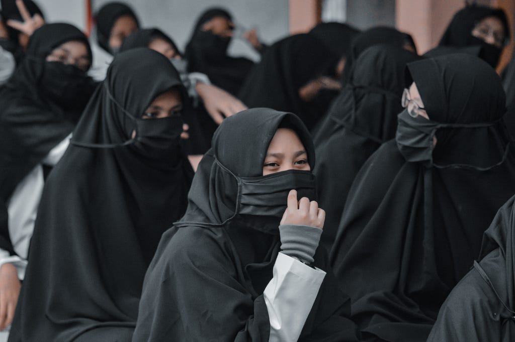 A group of female Muslim students wearing Hijab