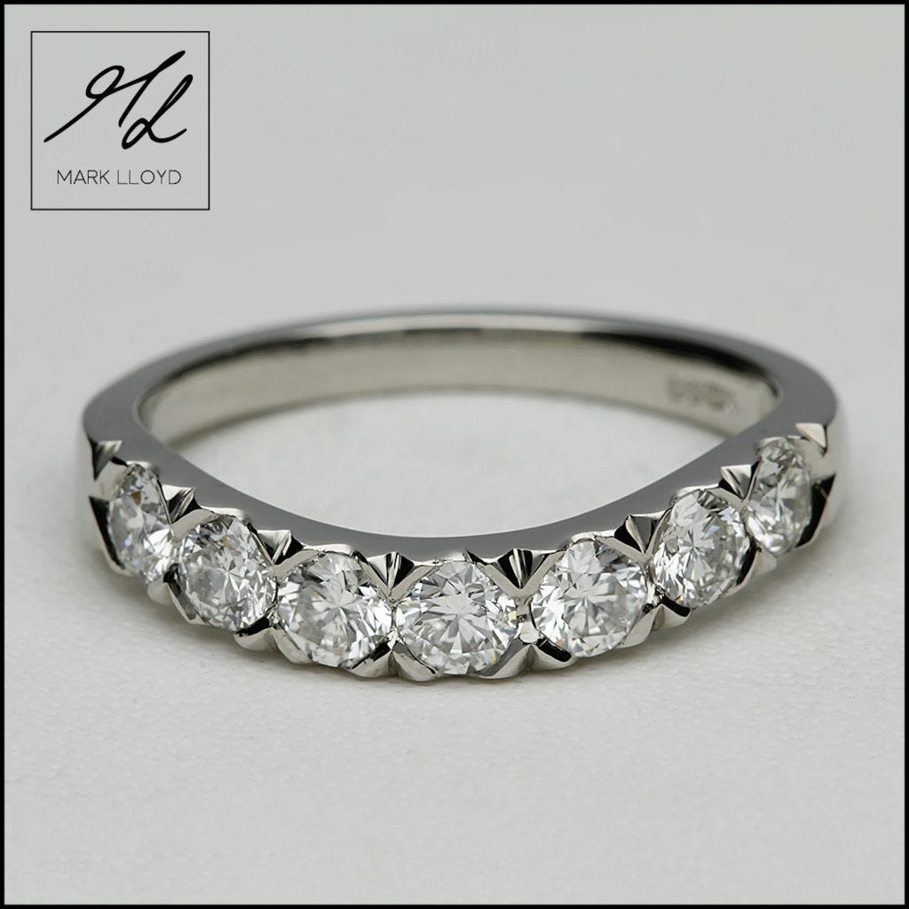 Picture of a design for a shaped to fit wedding ring with diamonds set on a slight curve by Mark Lloyd Master Goldsmith