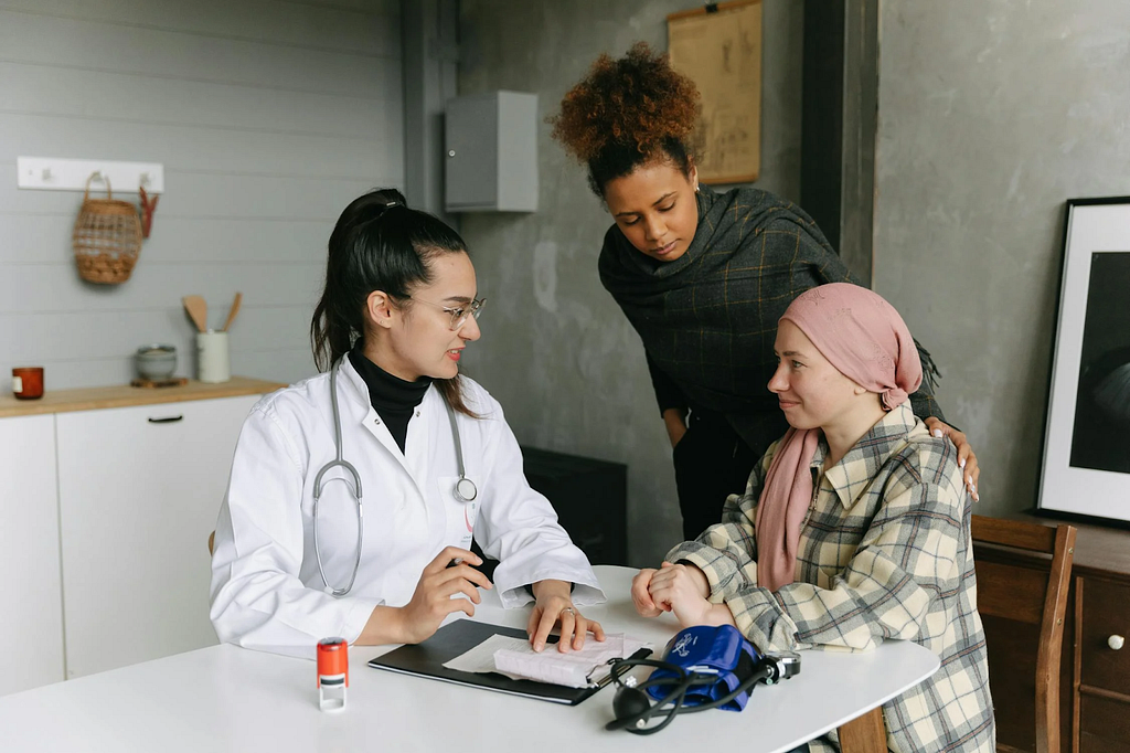 Cancer patient undergoing doctor consultation