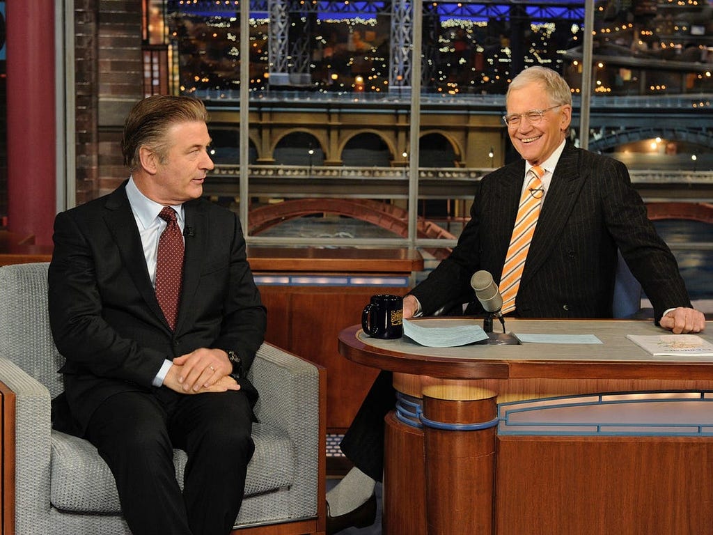 Alec Baldwin chats with Dave Letterman in 2013.