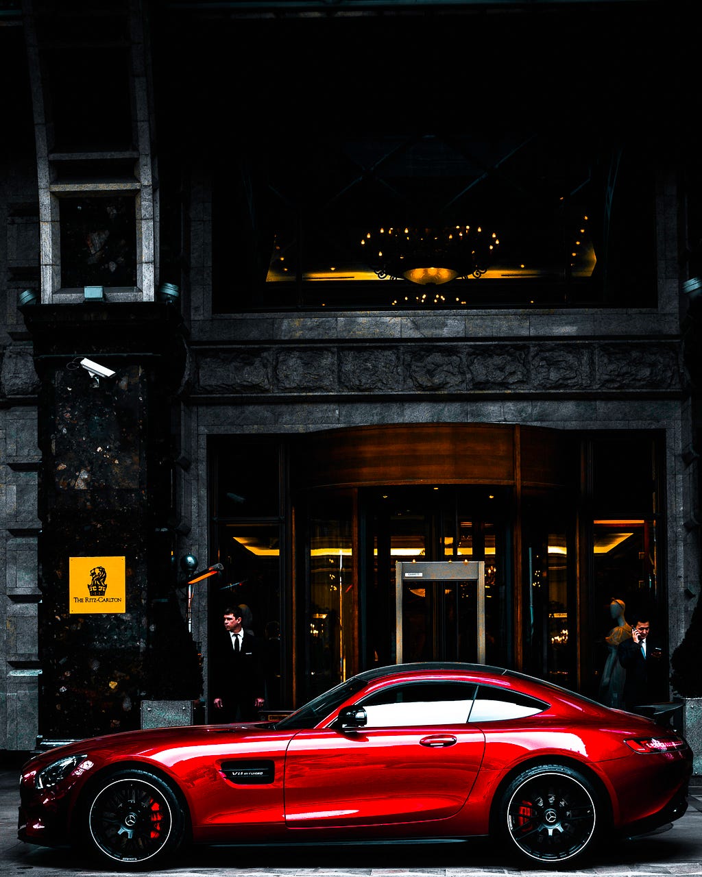 Car in front of a hotel