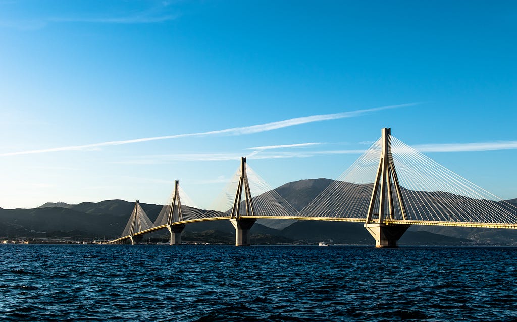 A modern suspension bridge spanning a body of water