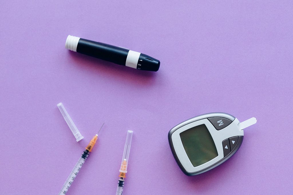 A glucometer, injections and lancet.