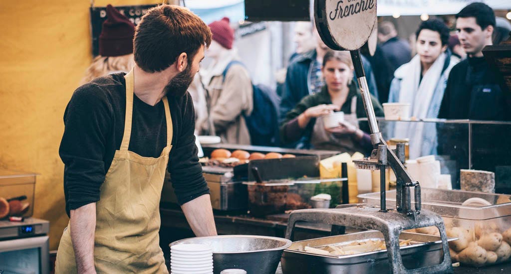 Small business owner interacting with difficult customers