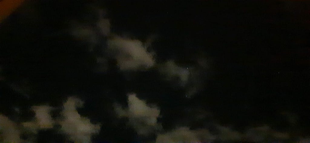 Night of stars and clouds