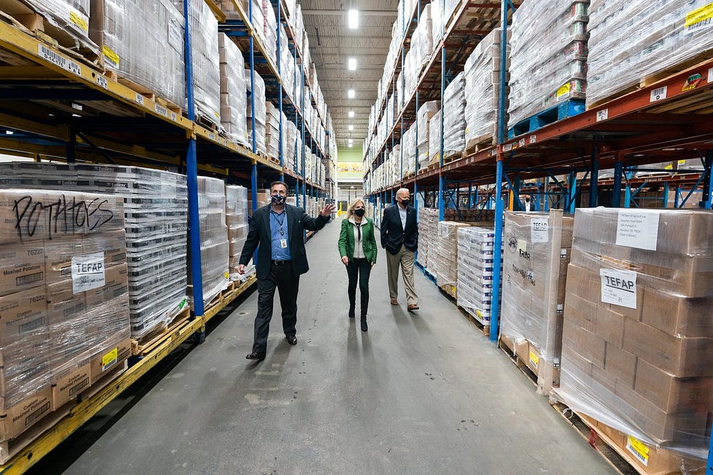 President Joe Biden and First Lady Jill Biden participate in a tour of the Houston Food Bank with Brian Greene, President of the Houston Food Bank, on Feb. 26, 2021, in Houston.