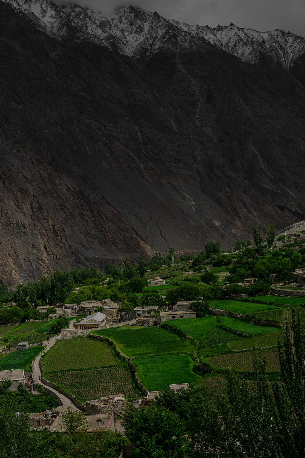 Hunza valley, Pakistan. A mountainous village in the bottom of very high peaks.