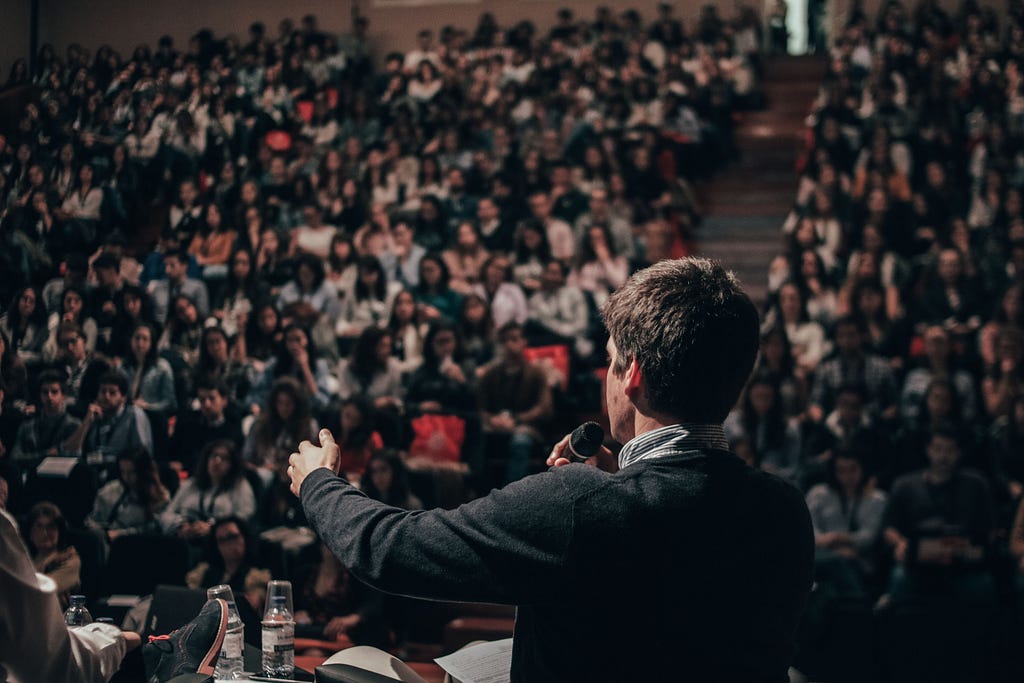 A speaker addressing an audience