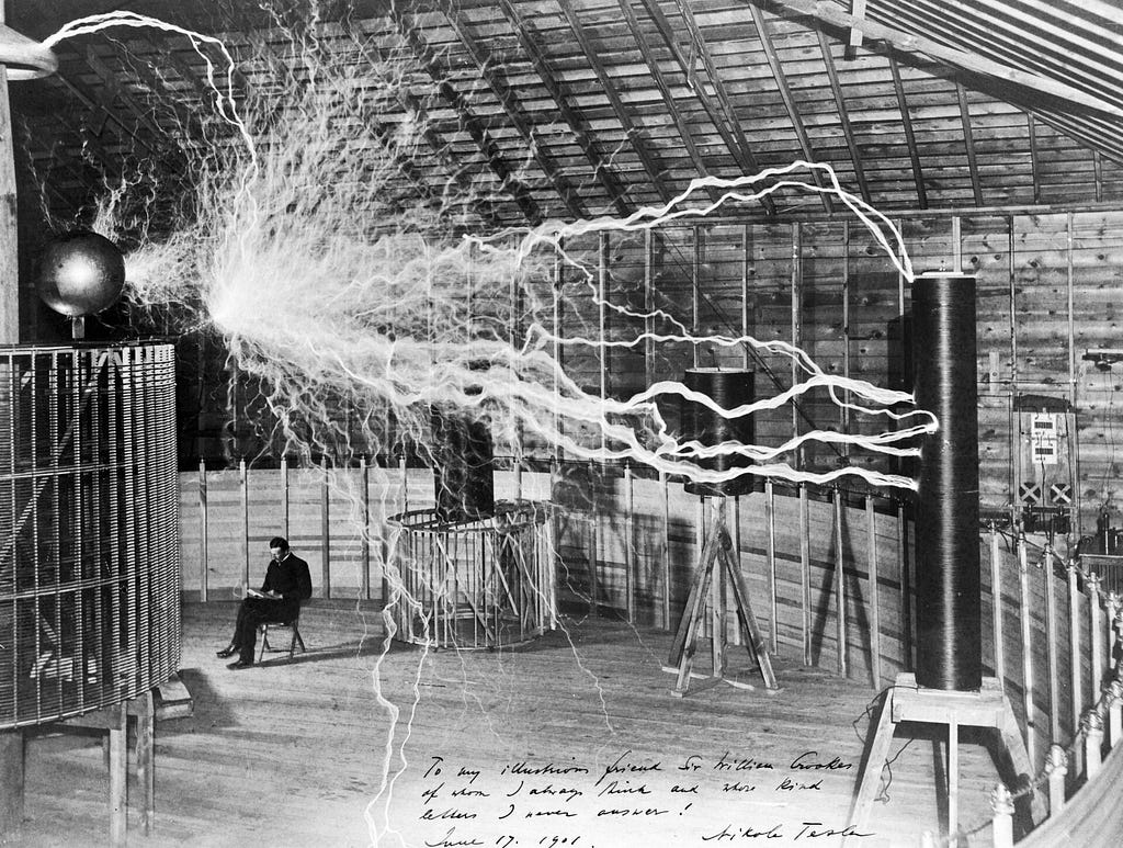 Nikola Tesla, with his equipment for producing high-frequency alternating currents. Credit: Wellcome Collection. Attribution 4.0 International (CC BY 4.0)