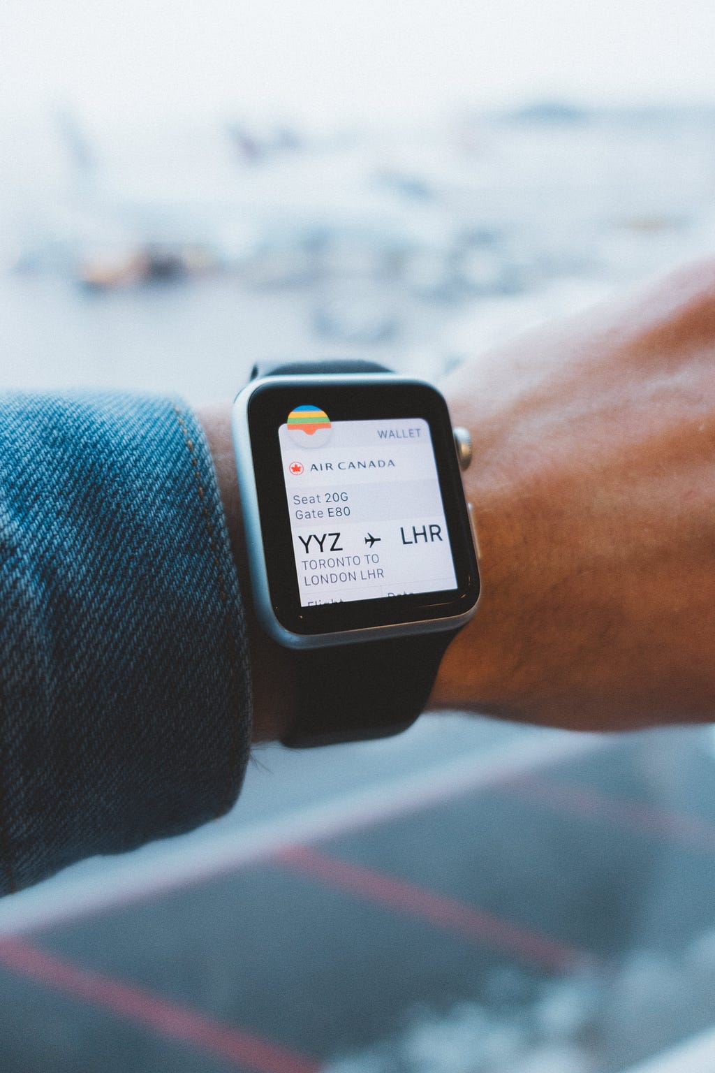 a boarding pass displayed on a smartwatch