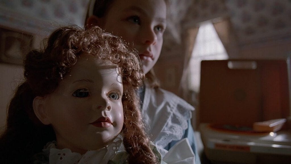 a scene from the X Files Chinga episode showing a young girl with a doll