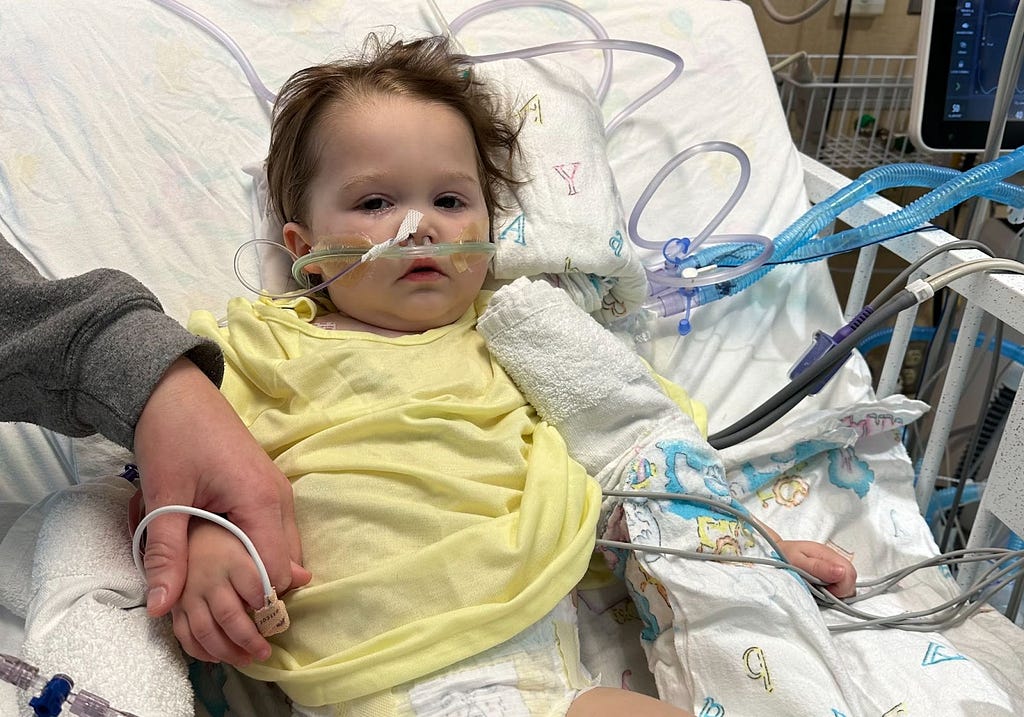 Baby in hospital with tubes attached