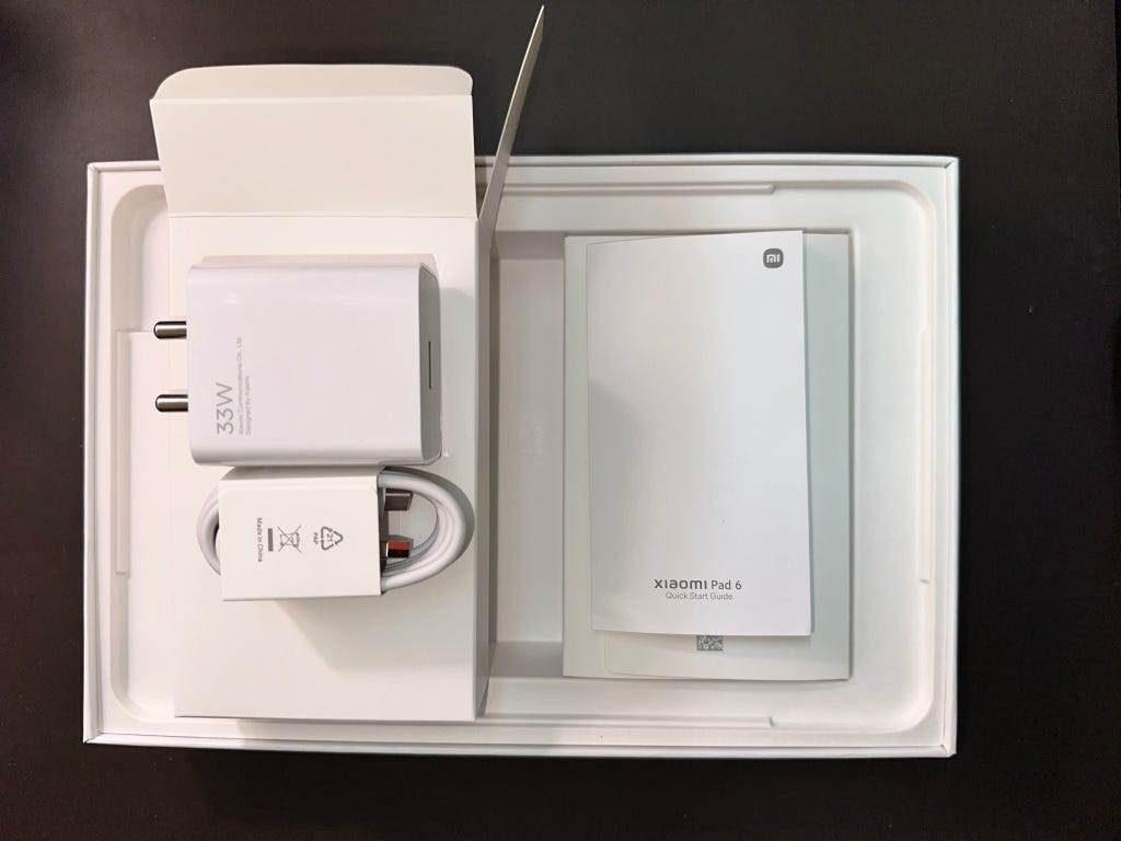 Xiaomi Pad 6 package contents include the tablet, 33W charging brick, USB-A to USB C charging cable and some paperwork