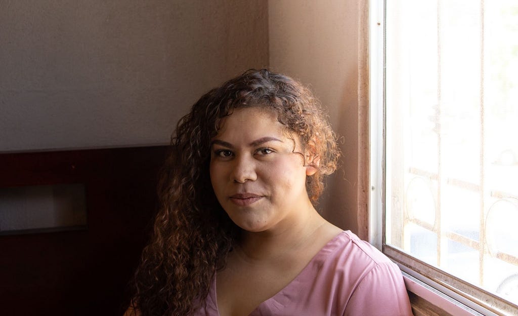 Portrait of Latina woman representing patients that benefit from genetic testing for hereditary cancer risks — Invitae blog