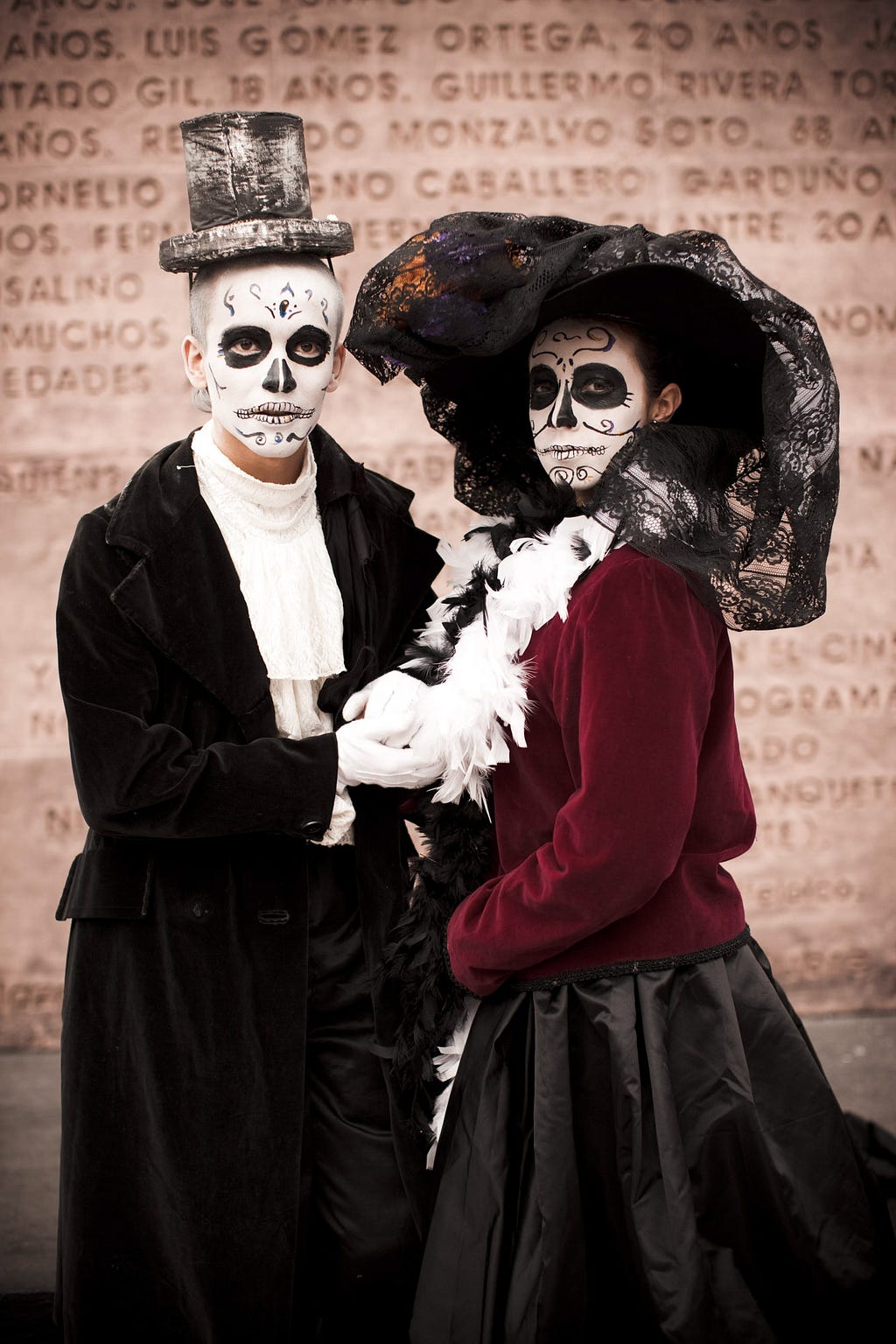 In the early twentieth century, Mexican cartoonist José Guadalupe Posada created a series of satiric zinc etchings depicting dandified calaveras (skeletons), including one wearing an extravagant bonnet. La Calavera Catrina and her consort are now an integral part of Day of the Dead festivities. ©James Fisher 2017 All Rights Reserved
