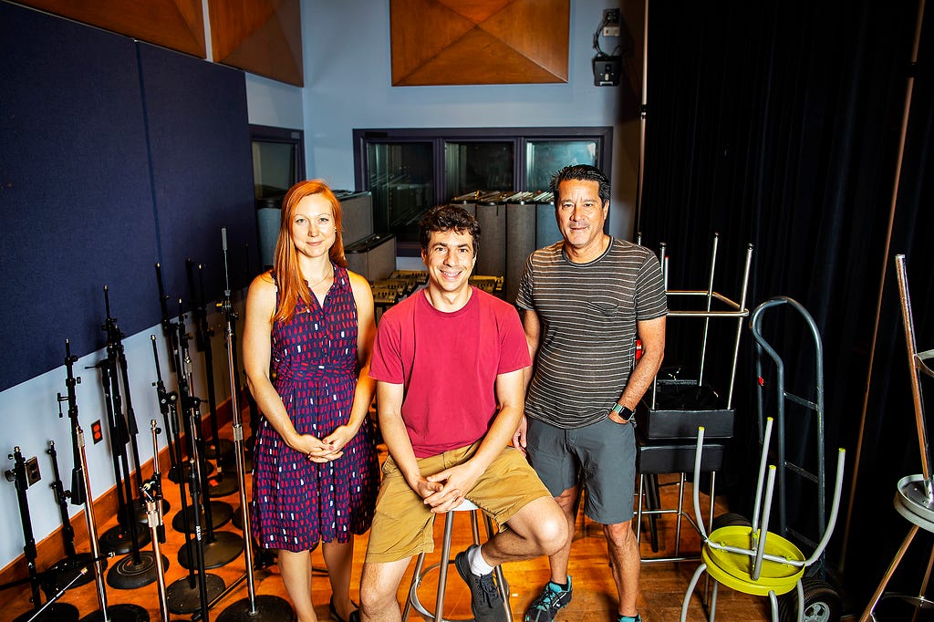 Lisa Miracchi, Aaron Roth and Michael Kearns sitting in a podcast studio.