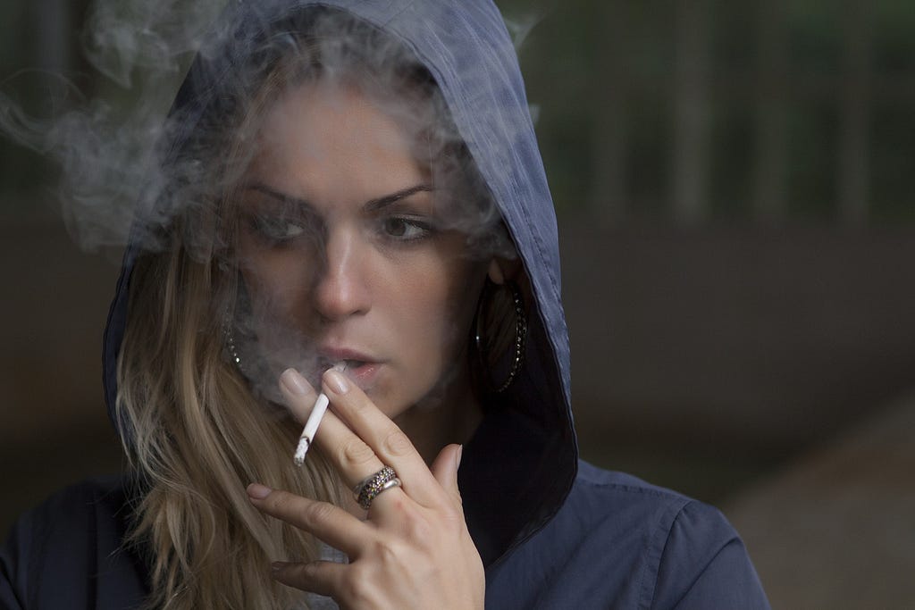 smoking woman weakening immune system