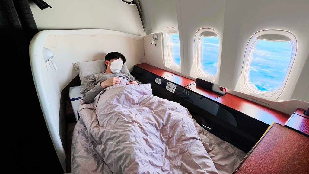 When to Sleep on Flight to Japan: Maximize Your Rest Time