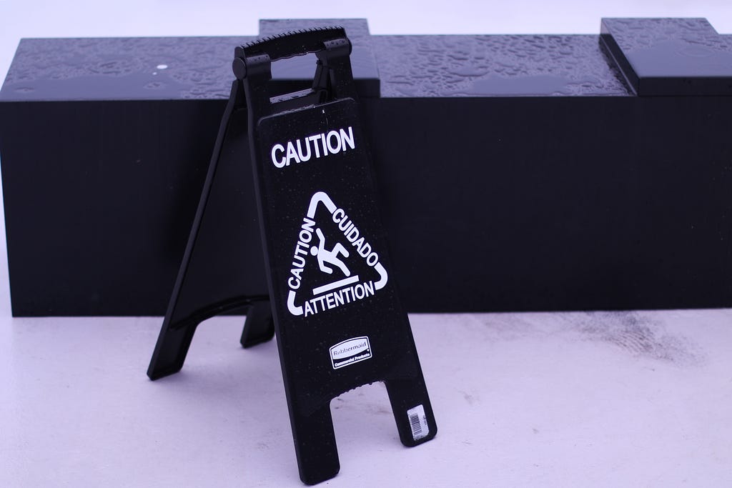 Caution, slippery when wet sign