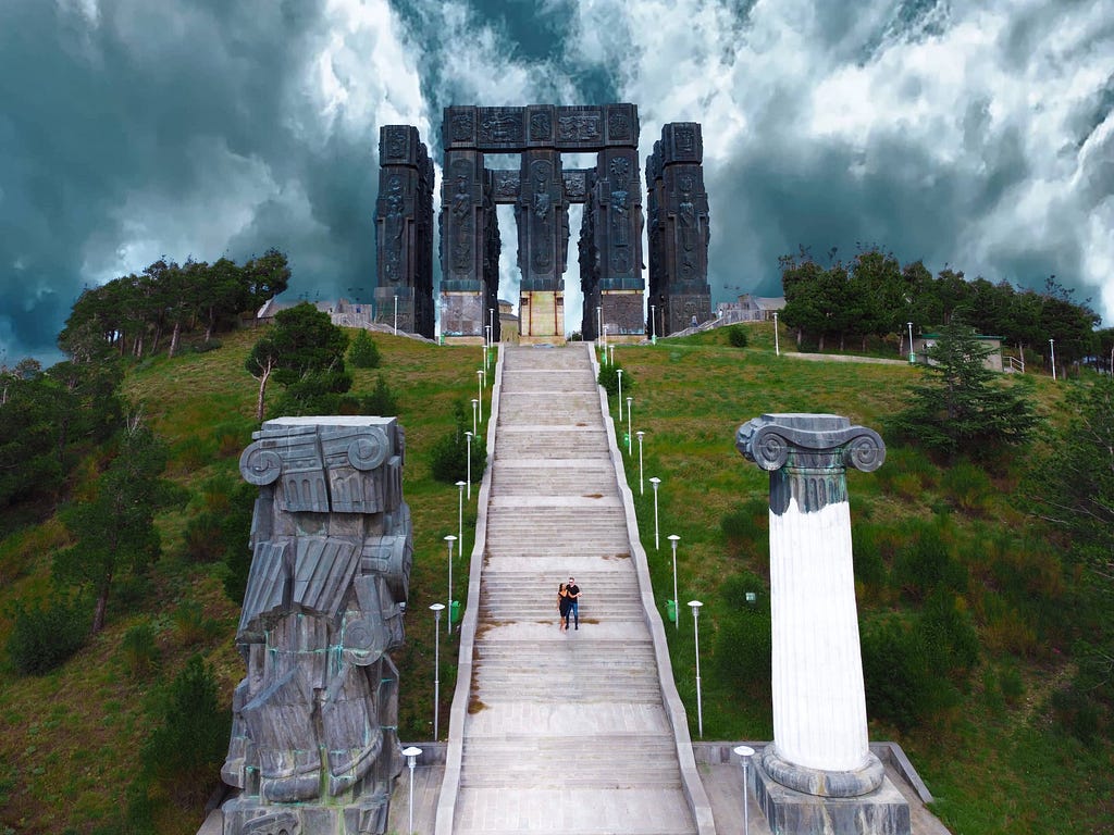 A stairway up to a monument on a hill