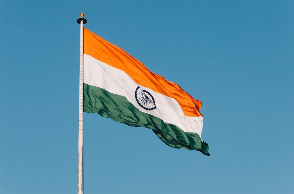 The Indian flag waves proudly in the breeze.