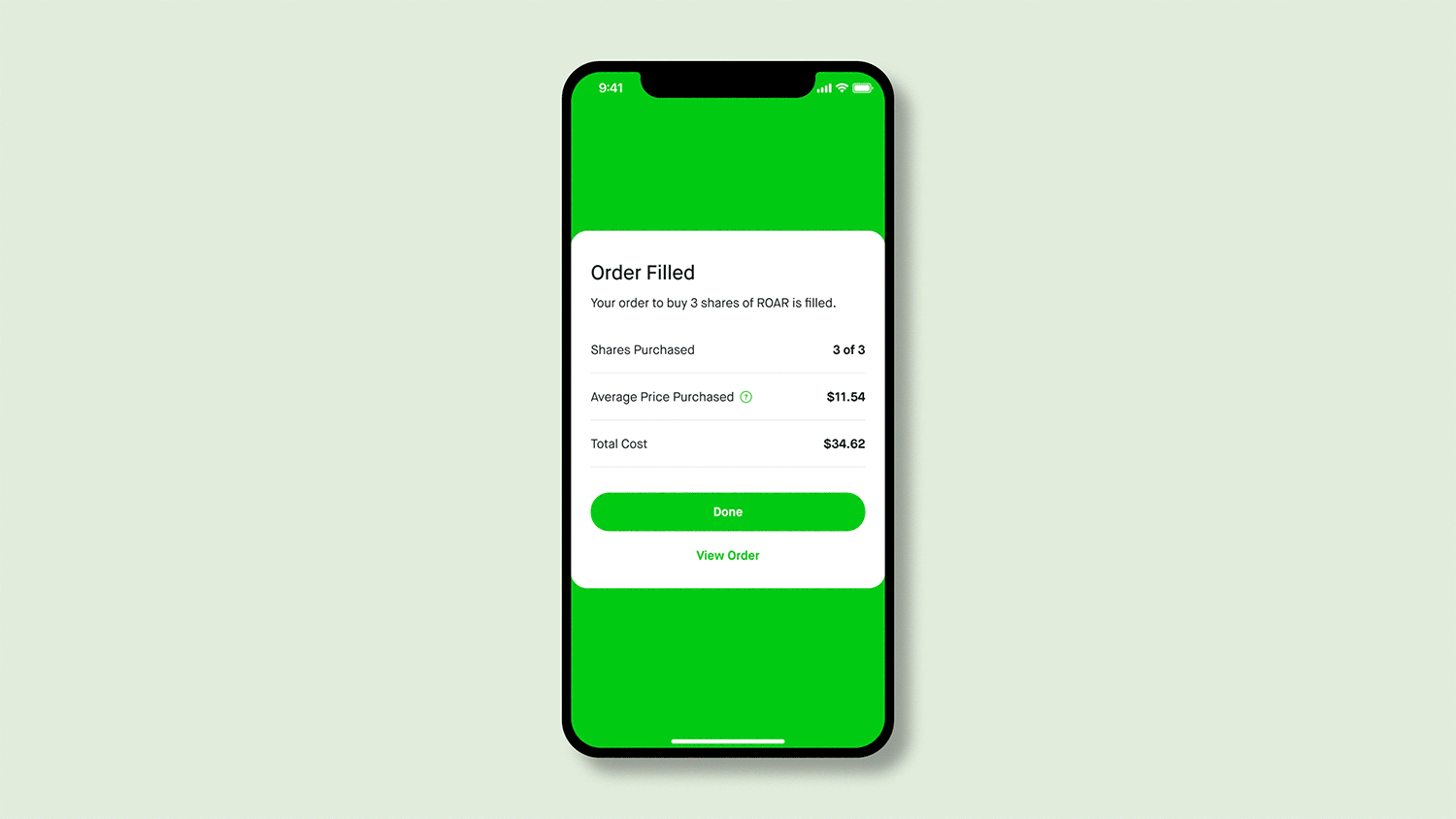 An animation celebrating a user’s first trade on the Robinhood app. Multiple 3-D green shapes (diamonds, blocks) float into the screen once a user completes their first trade.