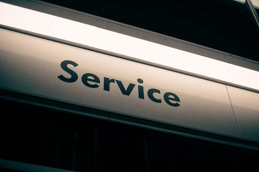 The image shows a sign with the word Service. Image credits at the end of the article.