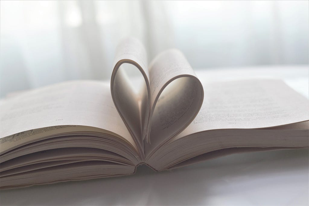 photo of book with pages in shape of heart posted on mickey markoff intro to inspirations website