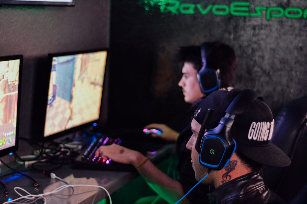 Gamers play online as part of an esports event