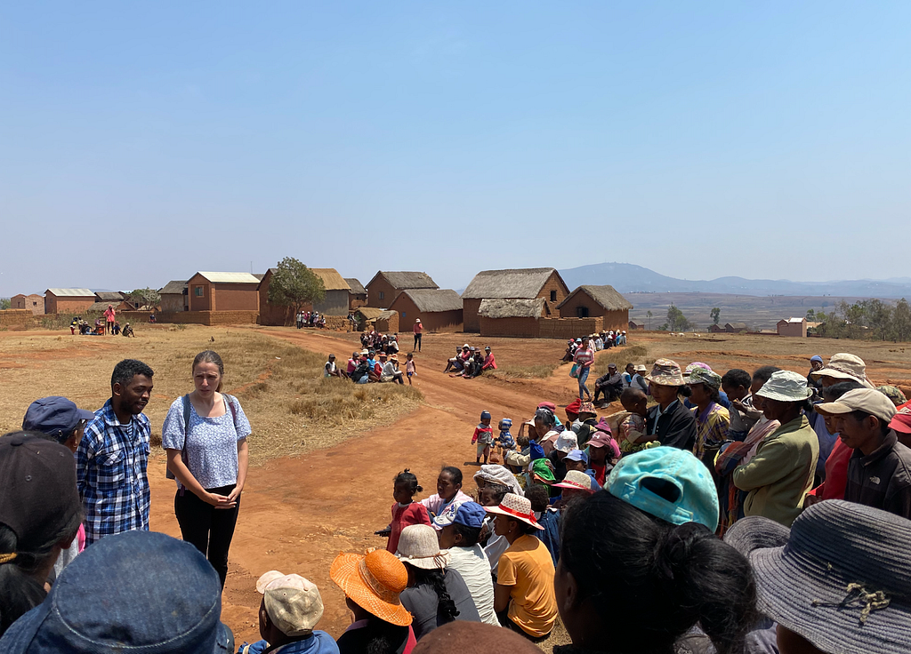 Julio, an anthropology graduate student from the University of Antananarivo, and Sarah, a cultural anthropologist representing Variant Bio, sharing research results with a participating community in the central highlands of Madagascar.