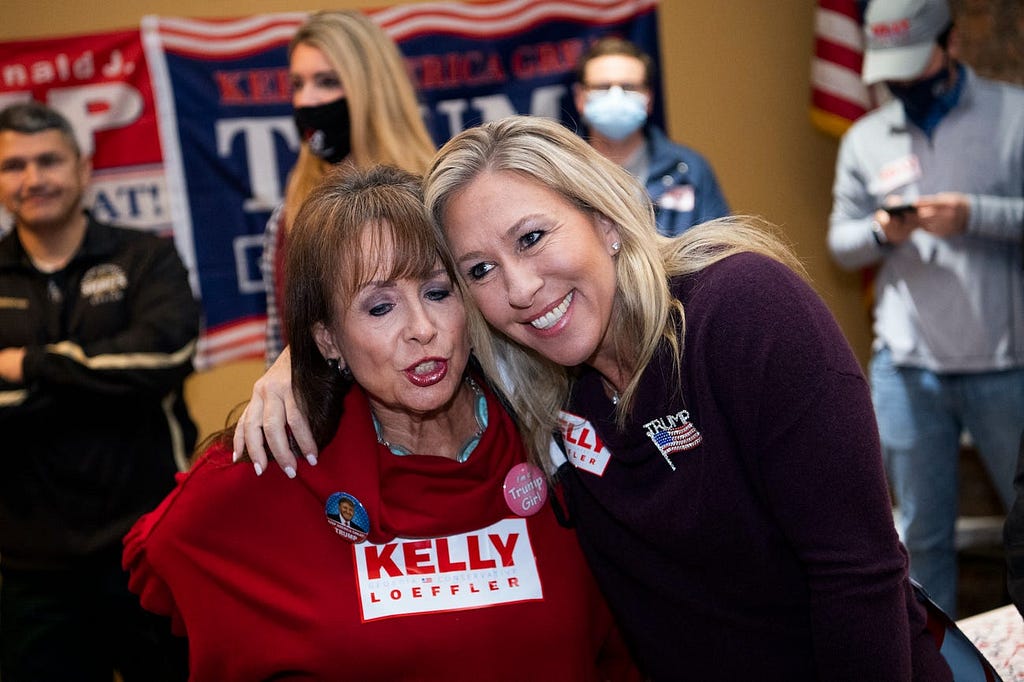 Greene with a supporter at a campaign event in Floyd County, Georgia, on October 31, 2020.