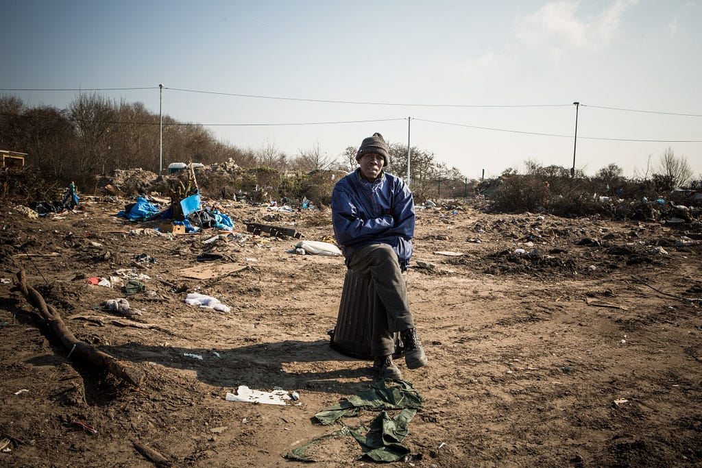  Abo Alraiga at the point in the Jungle where his house was located before authorities demolished the southern half of the encampment on the outskirts of Calais, violently displacing thousands of refugees in the process.